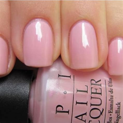 Sheer soft iridescent pink nail polish